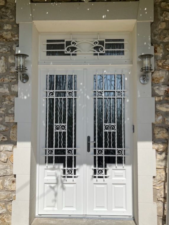 Porte d'entrée bois à Ploneis Bel'm